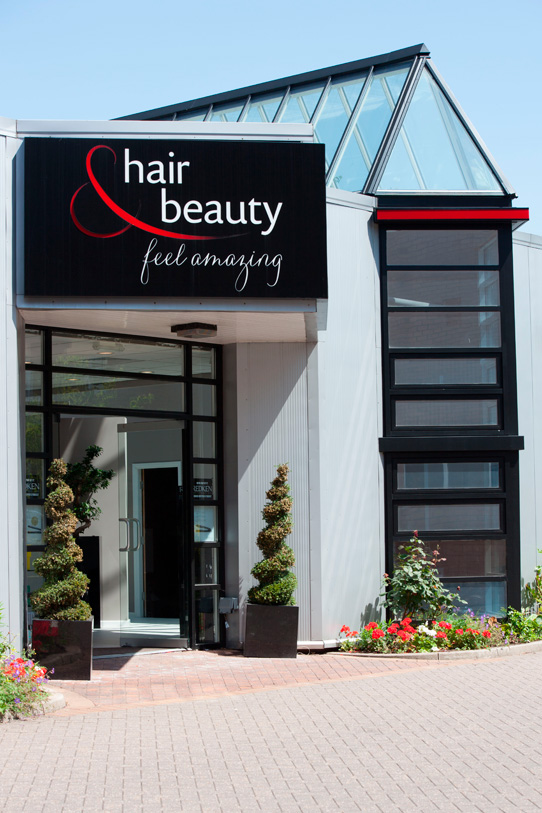 The entrance to the Hair and Beauty salon on a sunny day